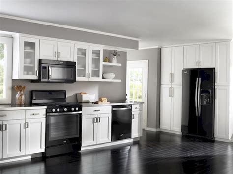 white kitchen cabinets black appliances